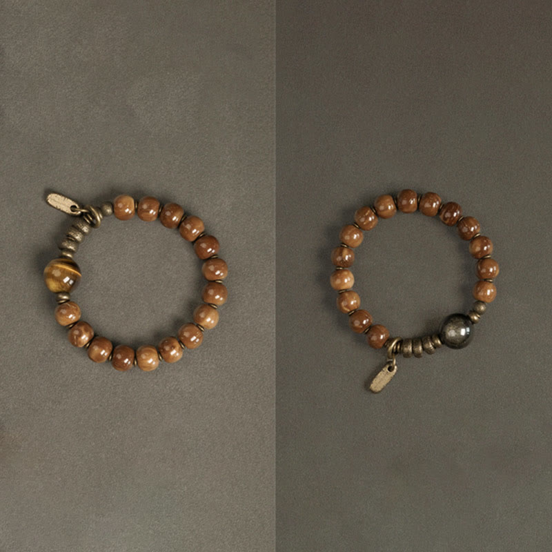 Bracelet de richesse en obsidienne œil de tigre et or brillant Kuka Seed