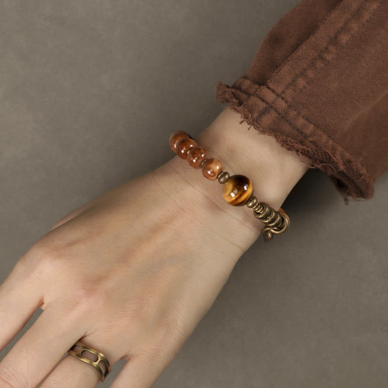 Bracelet de richesse en obsidienne œil de tigre et or brillant Kuka Seed