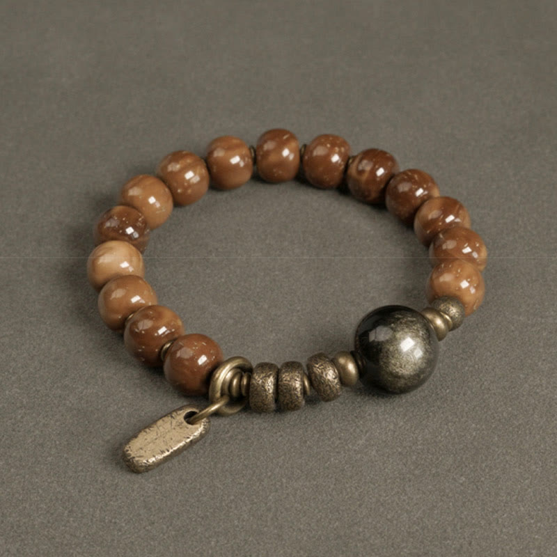 Bracelet de richesse en obsidienne œil de tigre et or brillant Kuka Seed