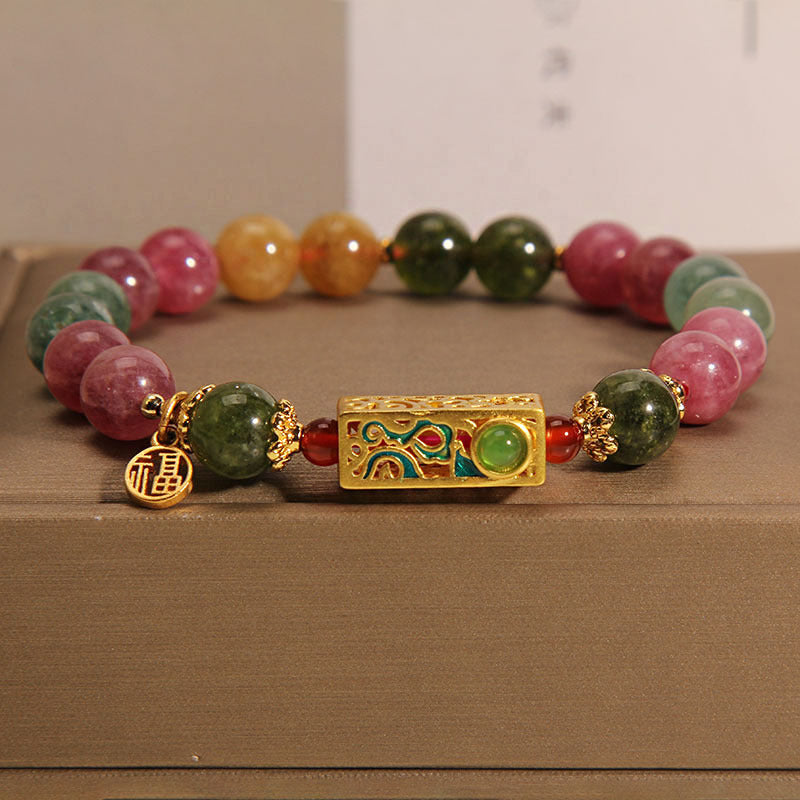 Bracelet en tourmaline avec breloque Fu positive pour le bonheur