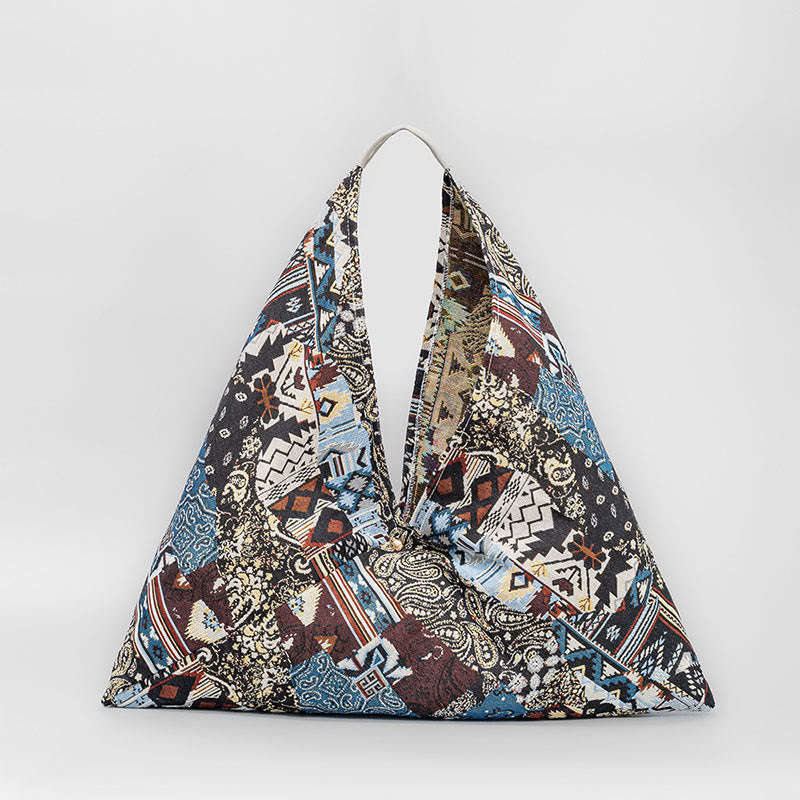 Sac bandoulière triangulaire en coton imprimé fleurs et papillons