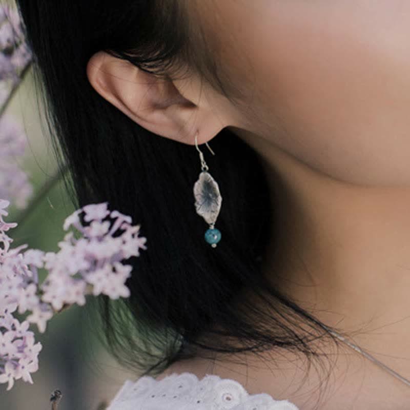 Boucles d'oreilles pendantes en feuille de lotus turquoise | Protection en argent 925