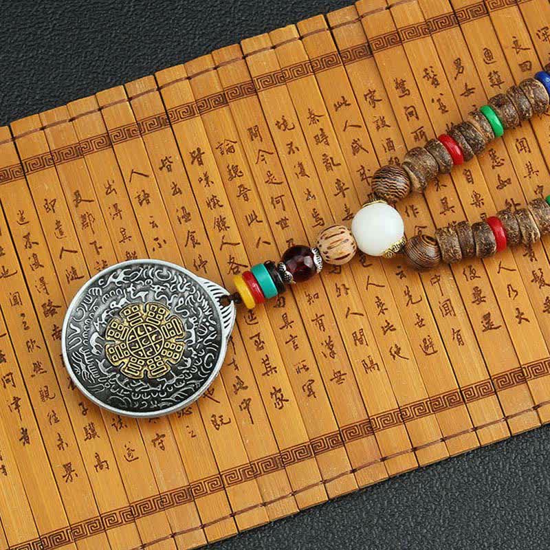 Collier roue de prière turquoise Om Mani Padme Hum