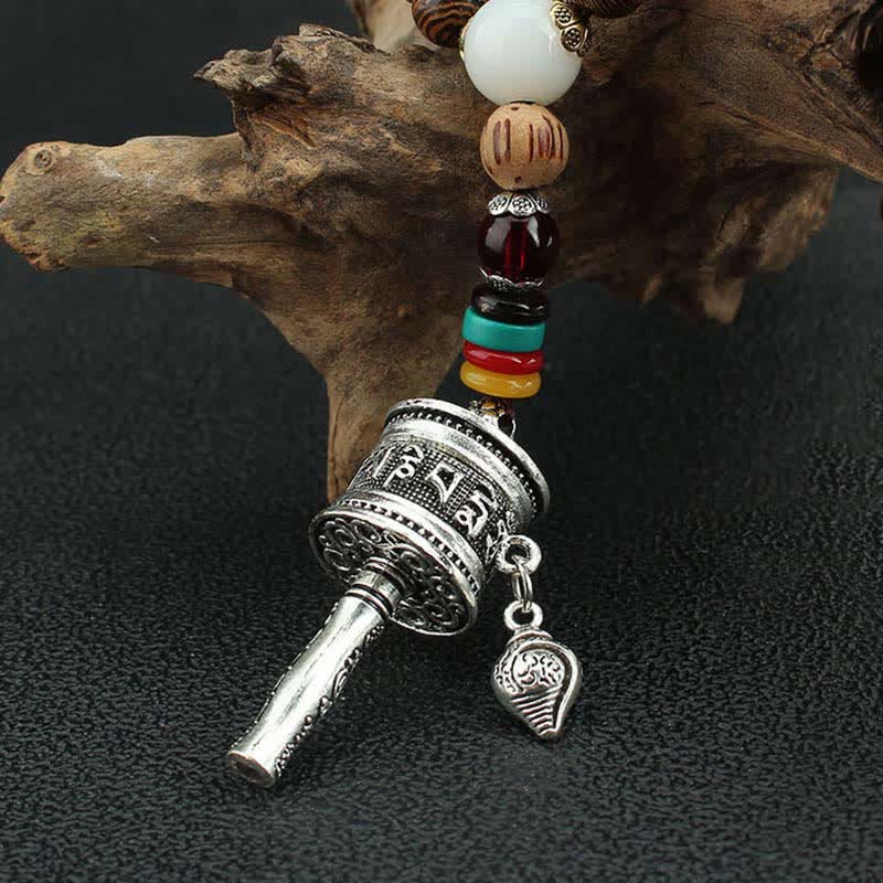 Collier roue de prière turquoise Om Mani Padme Hum