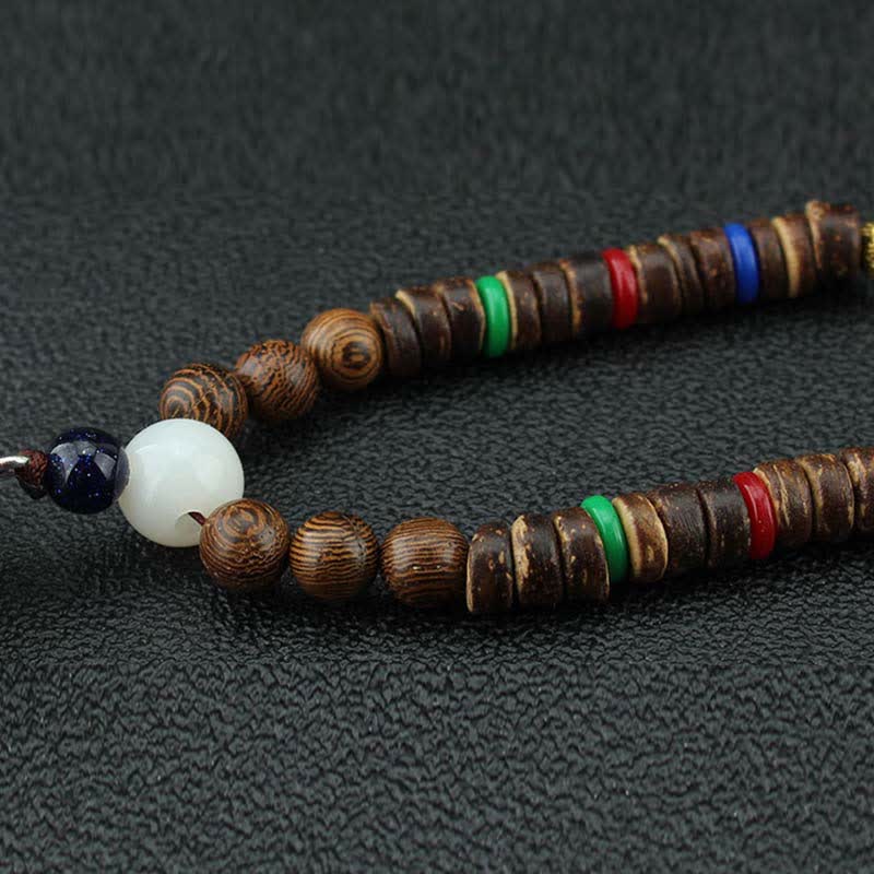 Collier roue de prière turquoise Om Mani Padme Hum