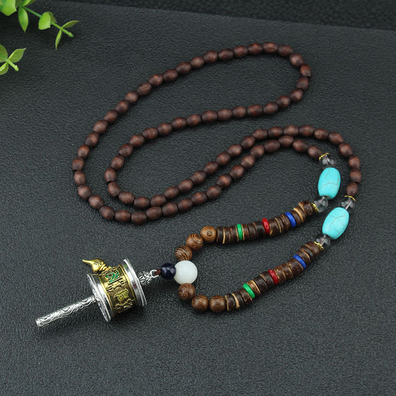 Collier roue de prière turquoise Om Mani Padme Hum