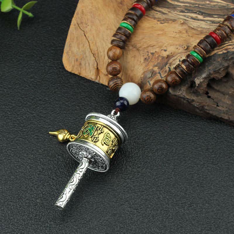 Collier roue de prière turquoise Om Mani Padme Hum