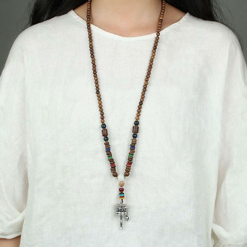 Collier roue de prière turquoise Om Mani Padme Hum