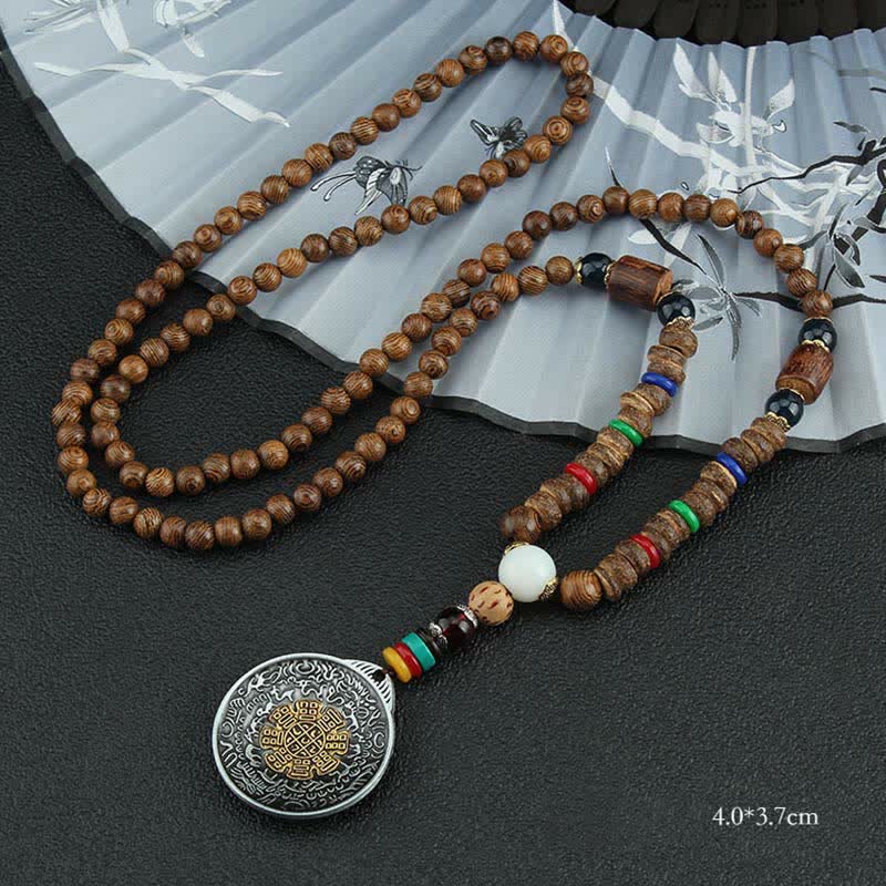 Collier roue de prière turquoise Om Mani Padme Hum