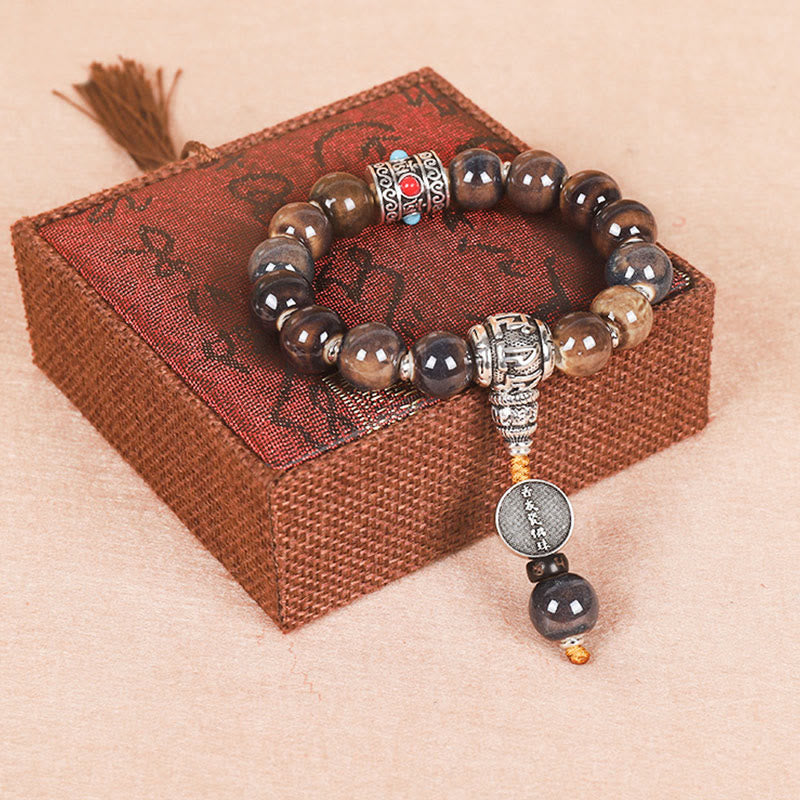 Bracelet de sagesse avec roue de prière turquoise Om Mani Padme Hum