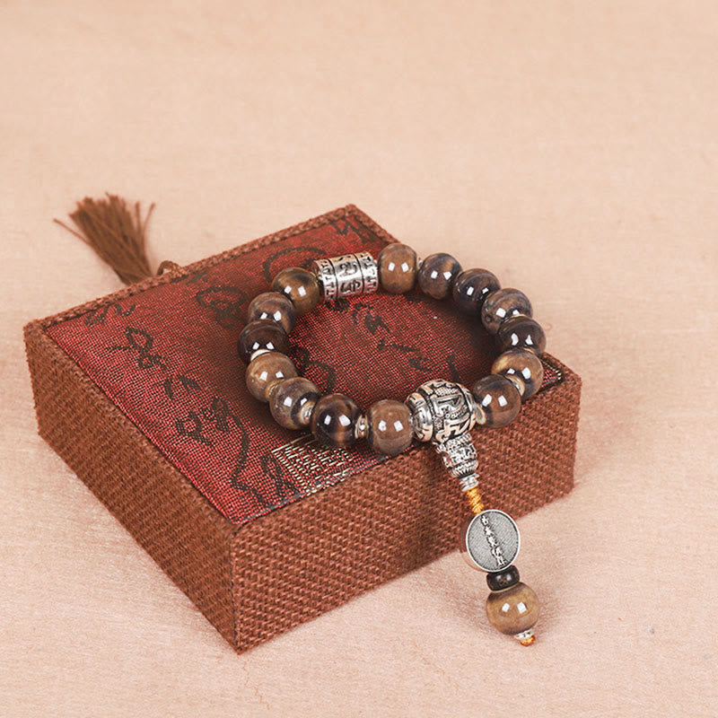Bracelet de sagesse avec roue de prière turquoise Om Mani Padme Hum