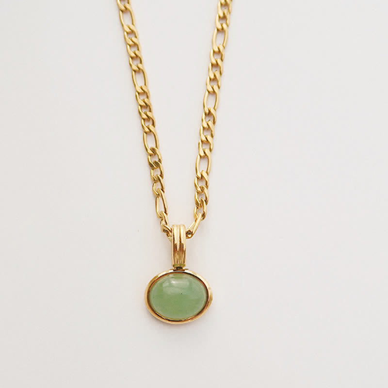 Collier pendentif ovale turquoise en acier titane