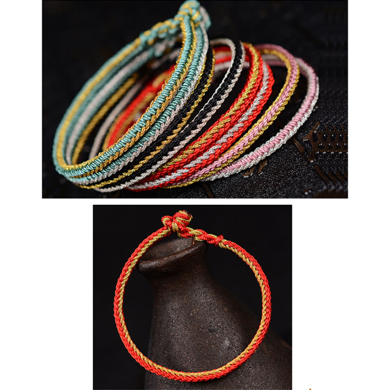 Bracelet bicolore artisanal à huit fils avec nœud de paix rouge
