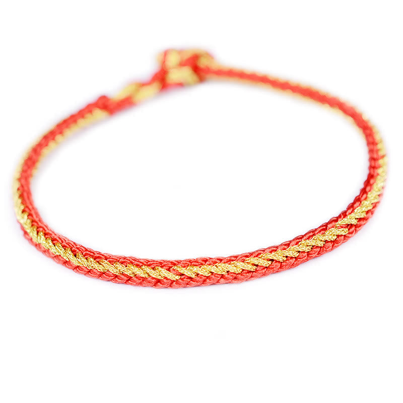Bracelet bicolore artisanal à huit fils avec nœud de paix rouge
