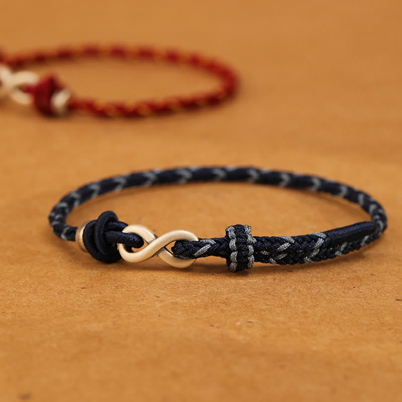 Bracelet unisexe en fil rouge de 14 à 18 cm avec nœud infini en argent sterling