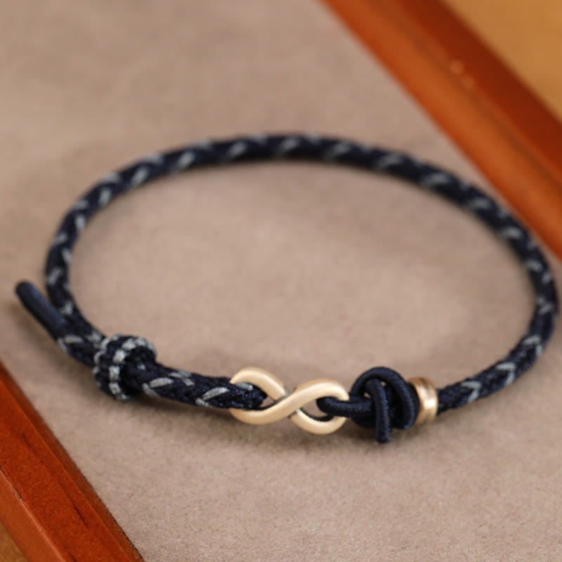 Bracelet unisexe en fil rouge de 14 à 18 cm avec nœud infini en argent sterling