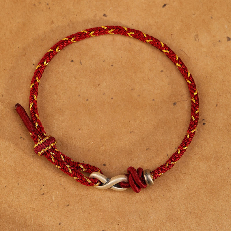Bracelet unisexe en fil rouge de 14 à 18 cm avec nœud infini en argent sterling