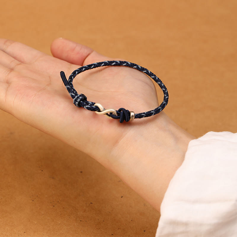Bracelet unisexe en fil rouge de 14 à 18 cm avec nœud infini en argent sterling
