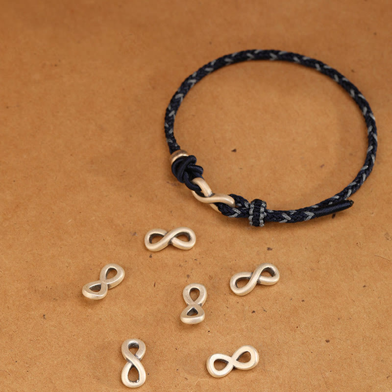 Bracelet unisexe en fil rouge de 14 à 18 cm avec nœud infini en argent sterling