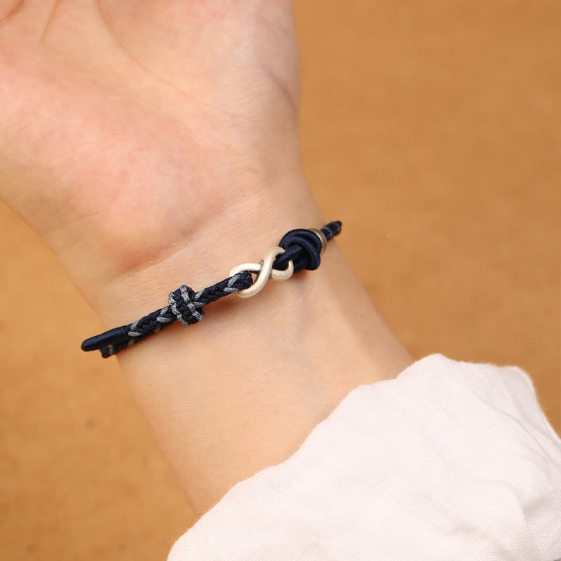 Bracelet unisexe en fil rouge de 14 à 18 cm avec nœud infini en argent sterling