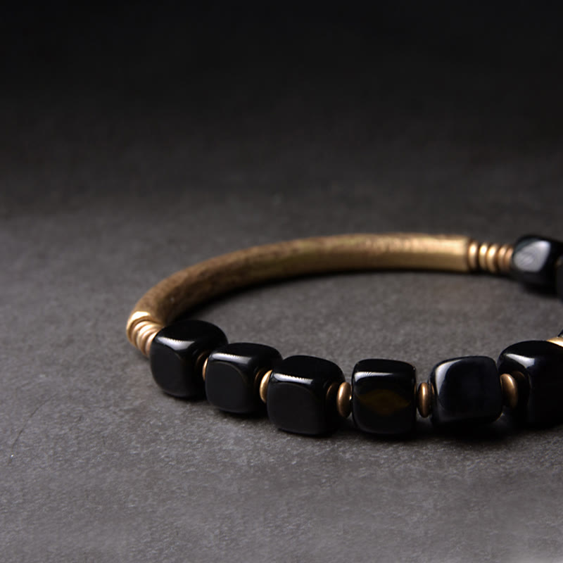 Bracelet unisexe en obsidienne noire et cuivre