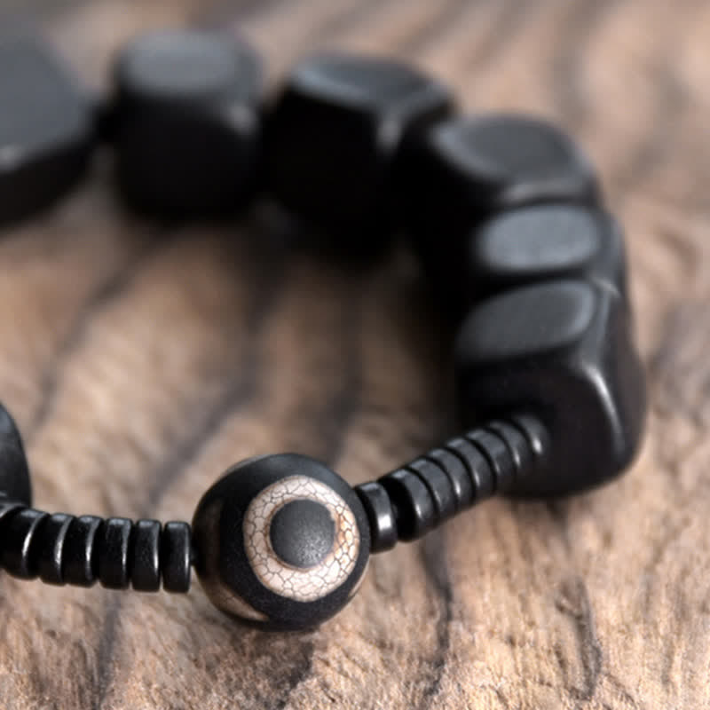 Bracelet spirituel unisexe en perles dzi en bois d'ébène pour la force