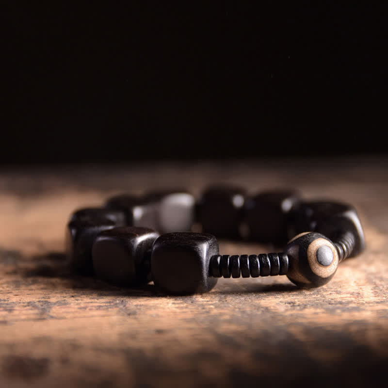 Bracelet spirituel unisexe en perles dzi en bois d'ébène pour la force