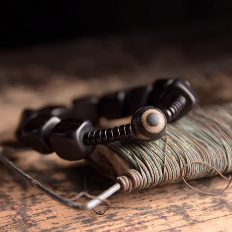 Bracelet spirituel unisexe en perles dzi en bois d'ébène pour la force