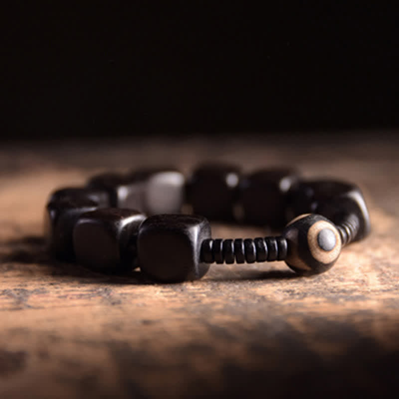 Bracelet spirituel unisexe en perles dzi en bois d'ébène pour la force