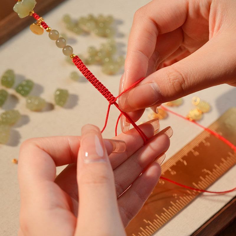 Bracelet unisexe en jade Hetian avec le symbole Fu pour la chance