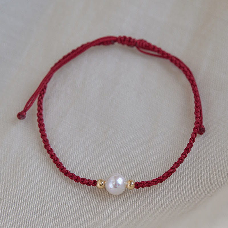Bracelet porte-bonheur unisexe en perles de 6 mm sur fil rouge