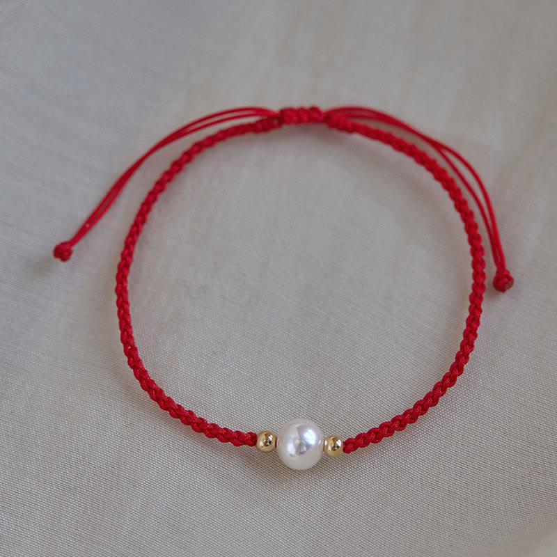 Bracelet porte-bonheur unisexe en perles de 6 mm sur fil rouge