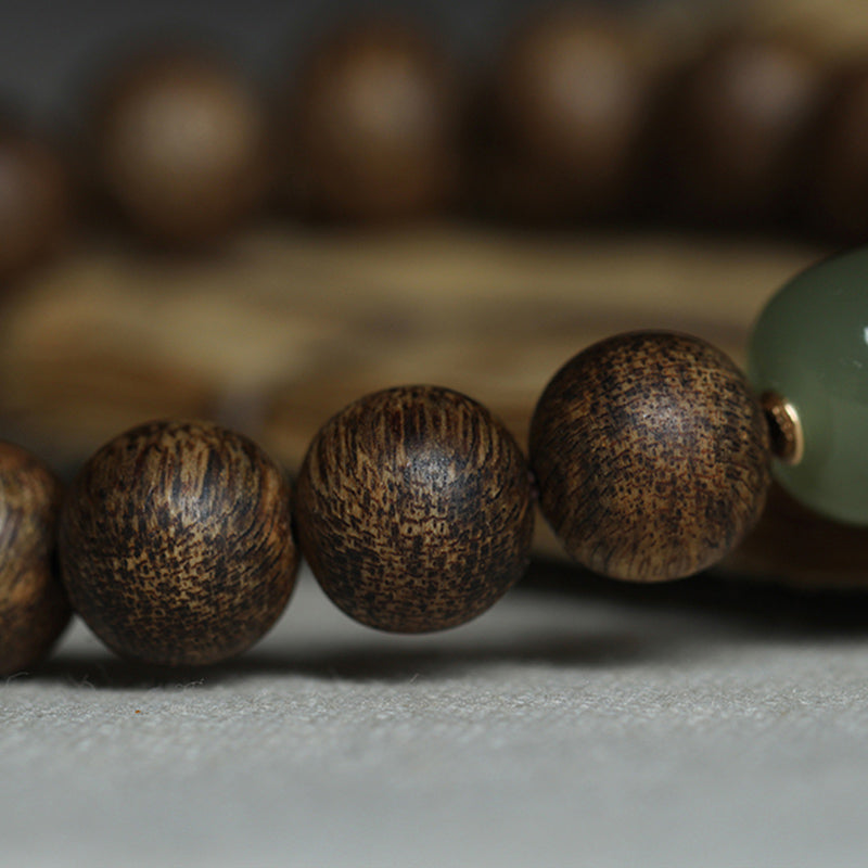 Bracelet de paix en bois d'agar Huang Qinan et jade Hetian du Vietnam