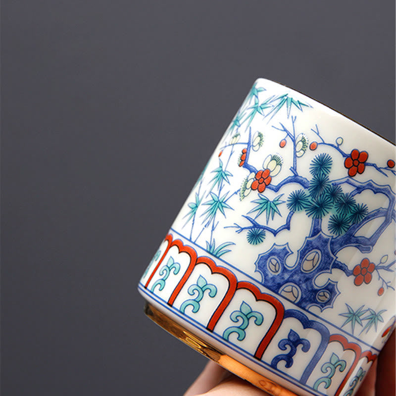 Tasse à thé vintage en céramique avec motifs de fleurs de prunier, de pin et de bambou