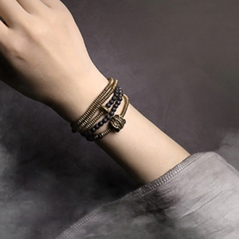 Bracelet spirituel vintage en cuivre et pierre de lave pour l'équilibre