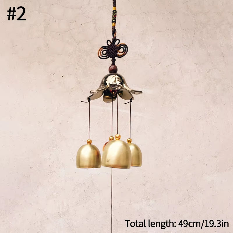 Vintage Metal Wind Chime with ornate hook and three bell-shaped brass chimes for garden decor
