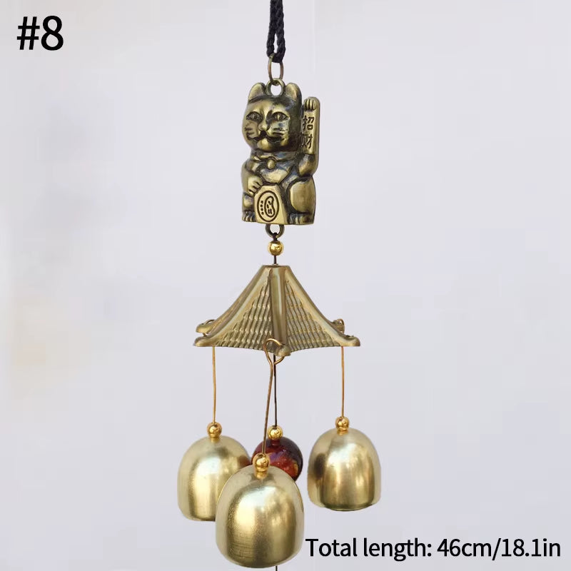 Decorative brass wind chime with four bells under a pagoda roof for vintage garden decor