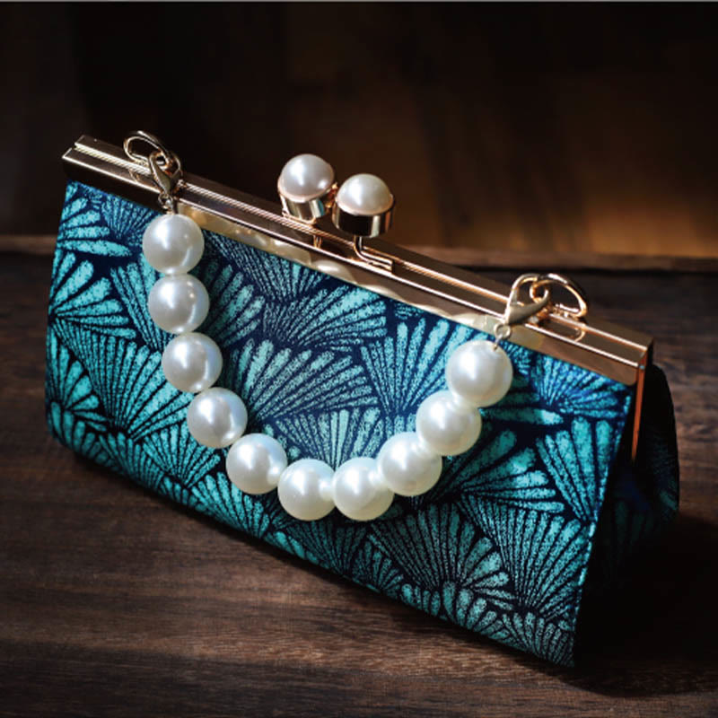 Sac à main vintage en métal nacré à motif de feuilles bleu paon