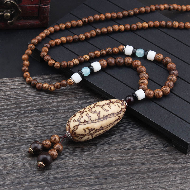 Collier d'équilibre en bois de wengé et agate pour la paix et la protection