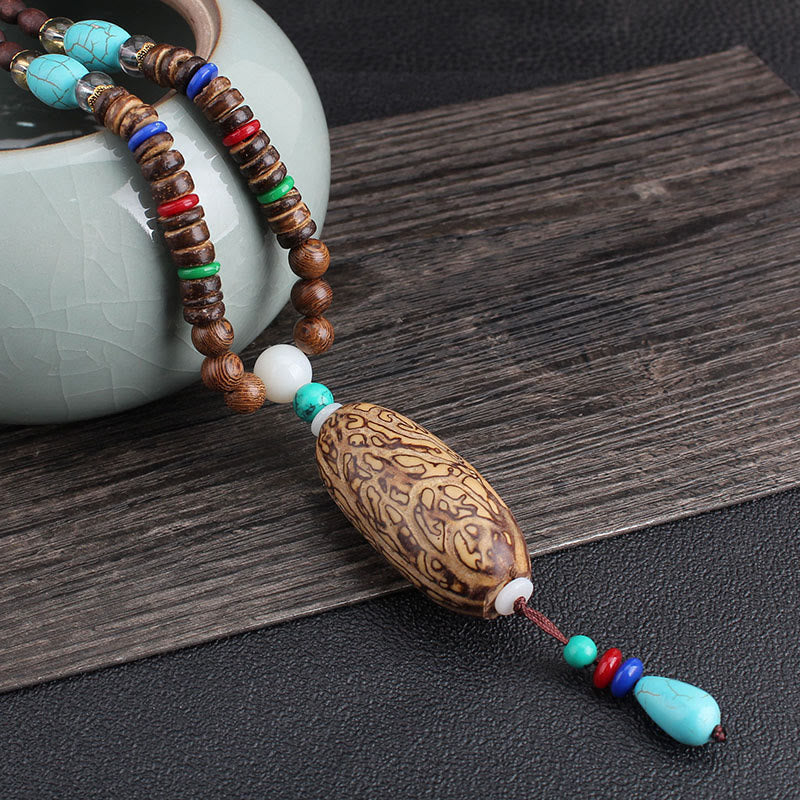 Collier d'équilibre en bois de wengé et agate pour la paix et la protection