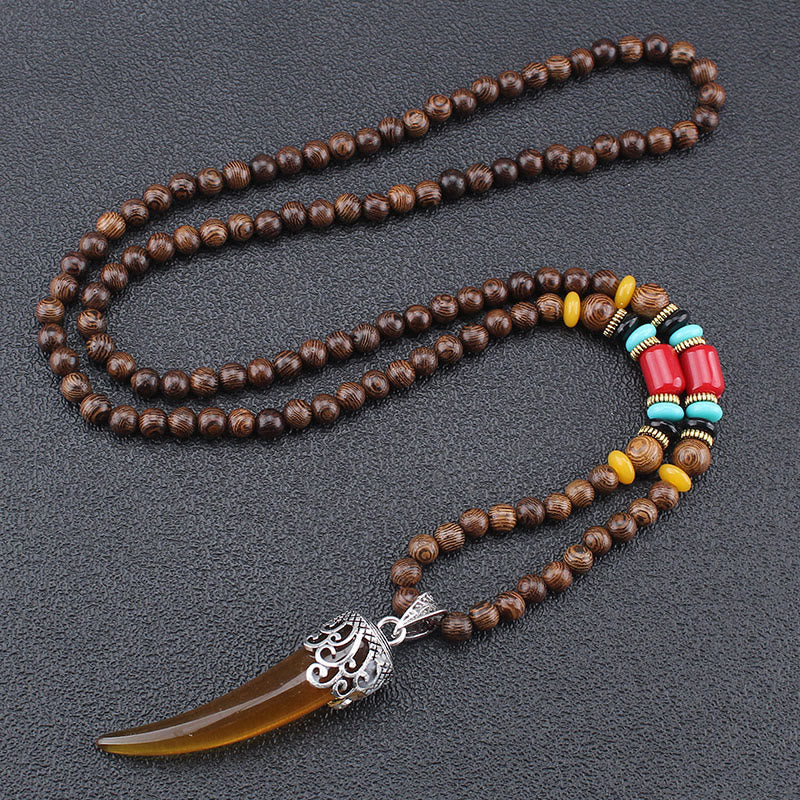 Collier pendentif en bois de wengé turquoise pour la protection et l'équilibre