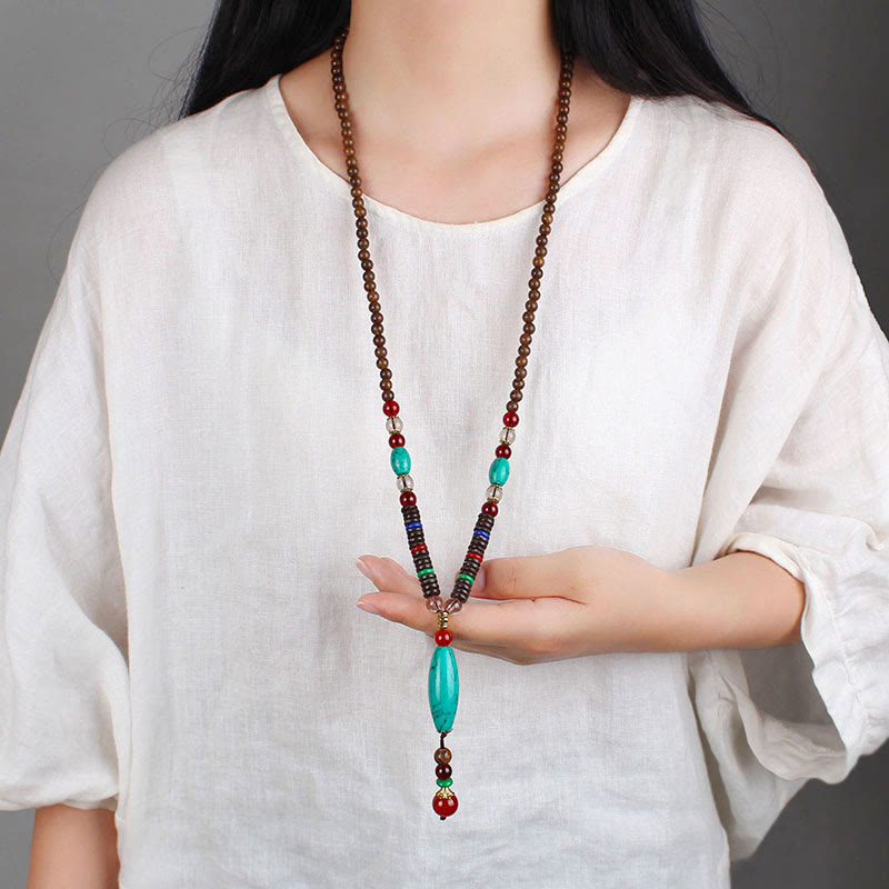 Collier en bois de wengé turquoise pour la protection et le calme 80 cm