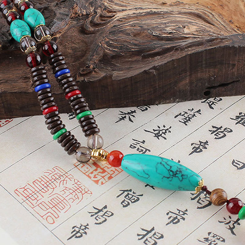 Collier en bois de wengé turquoise pour la protection et le calme 80 cm