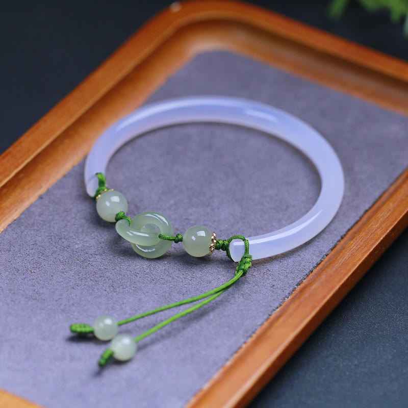 Bracelet d'harmonie entrelacé en jade Hetian et agate blanche