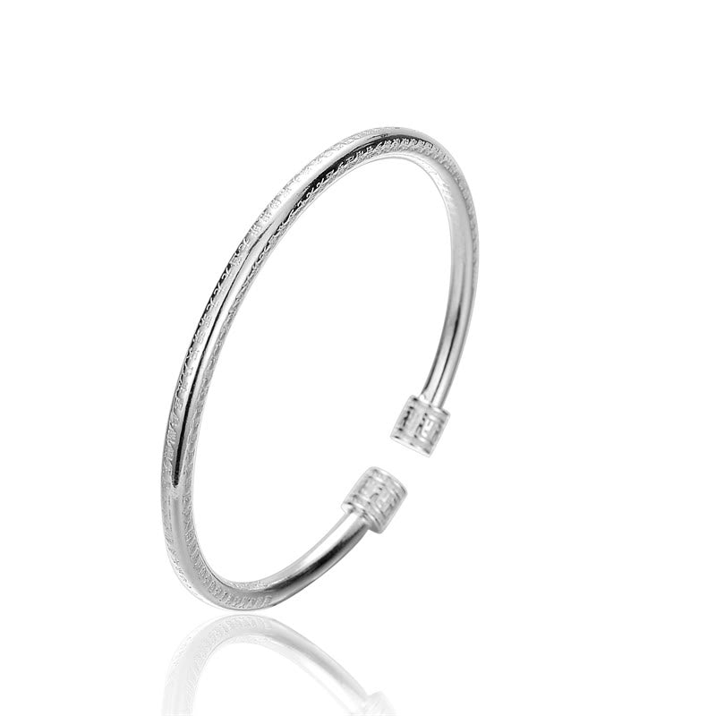 Bracelet Bouddha en cuivre blanc à motif svastika pour la chance et l'équilibre