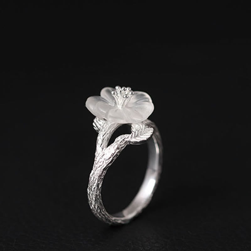 Bague de guérison réglable en cristal blanc avec fleur squelette