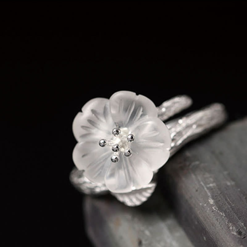 Bague de guérison réglable en cristal blanc avec fleur squelette
