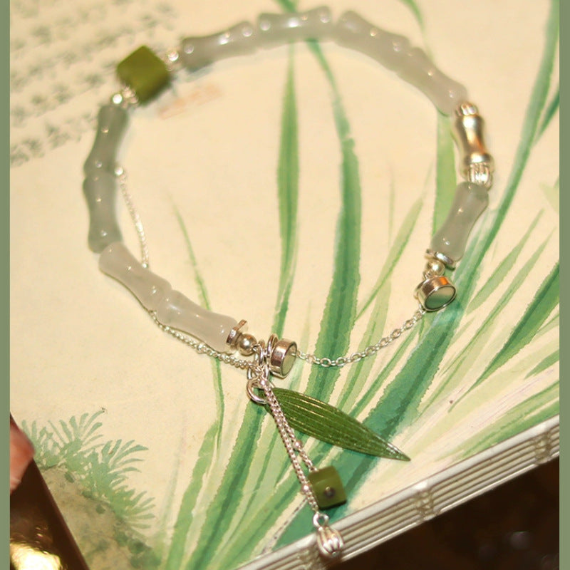 Bracelet du bonheur en jade blanc avec breloque lanterne en feuille de bambou