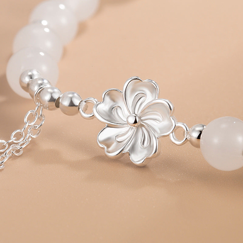 Bracelet porte-bonheur en jade blanc et fleur de pêcher 15-16 cm