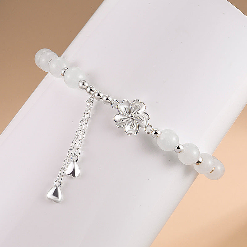 Bracelet porte-bonheur en jade blanc et fleur de pêcher 15-16 cm